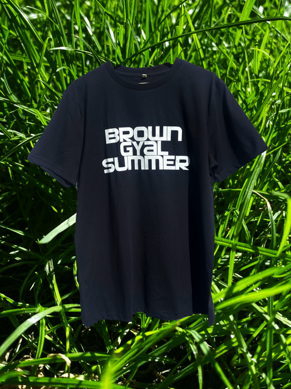 Brown Gyal Summer T-Shirt with a green grass background